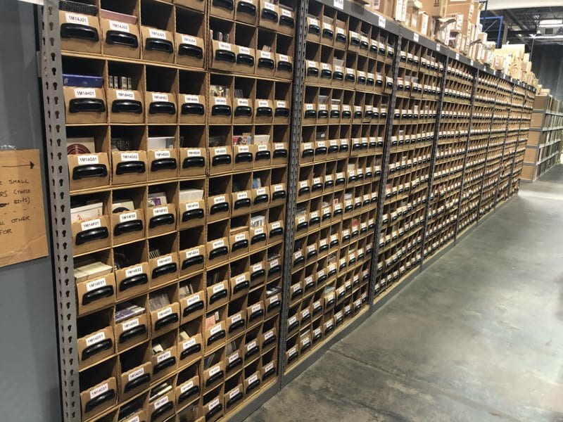 Warehouse aisle of bin boxes; Warehouse racking; Racking bins