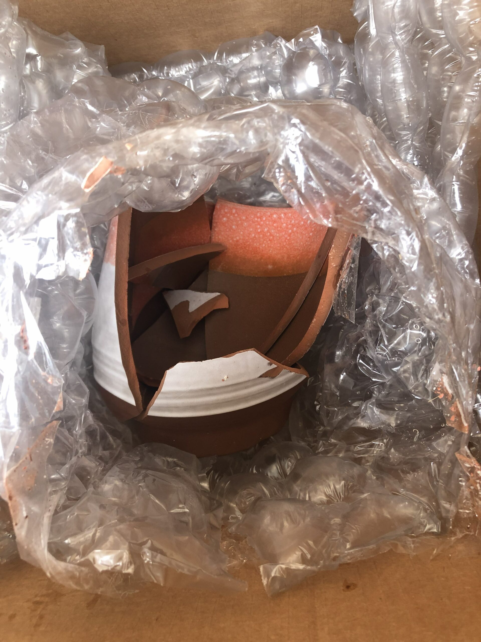 Broken pout inside of Damaged Packaging; Damaged packages; shipping damage
