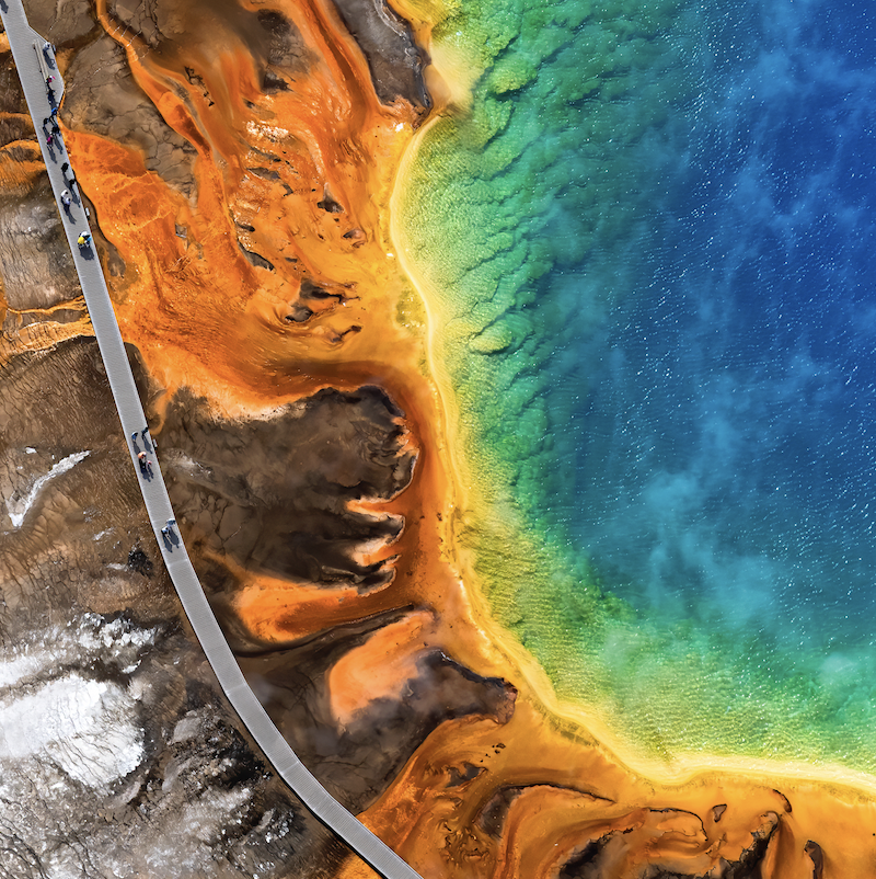 Sustainability Report cover photo of lake in Yellowstone National Park