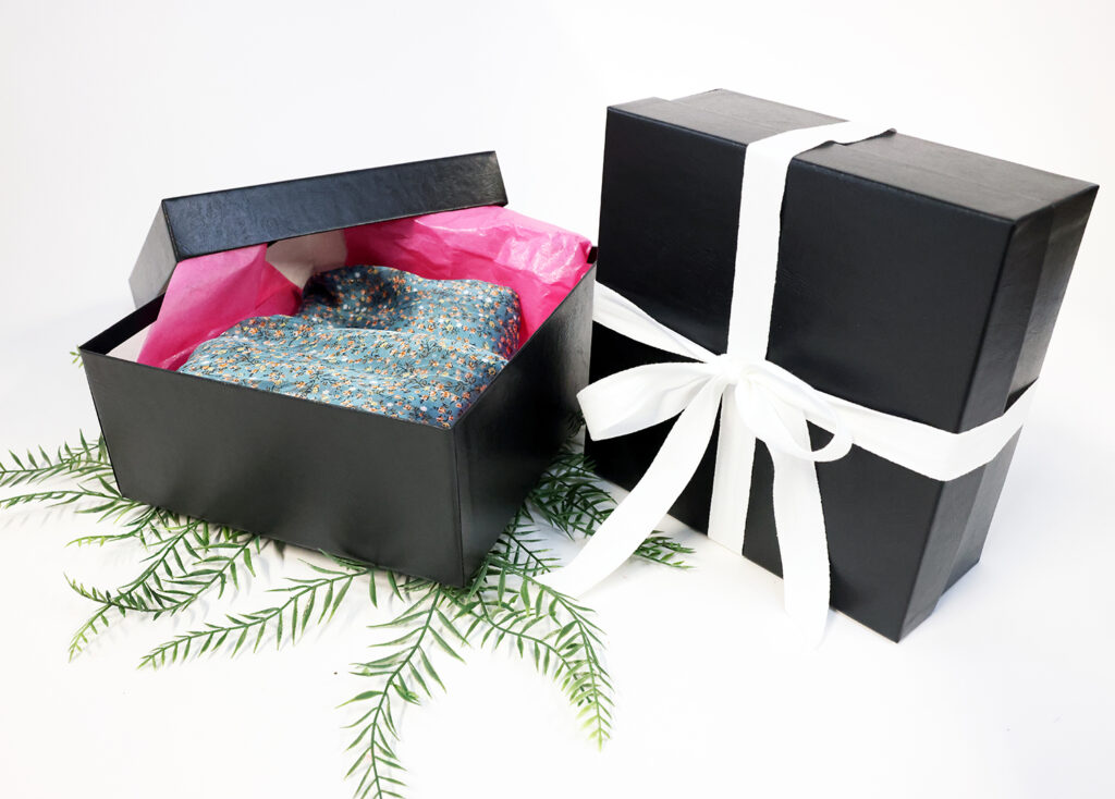 Shirt packed in black luxury box; Luxury Packaging example