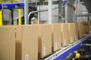 Boxes at fulfillment center on conveyor ready to be shipped