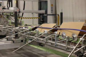 Box manufacturing machine at Premier Packaging production plant