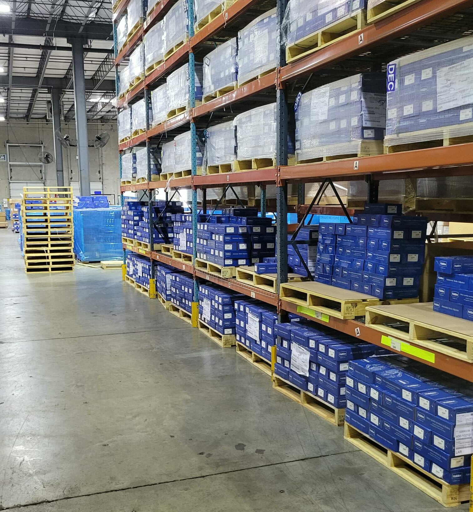 Premier Packaging Corrugated boxes on warehouse shelf