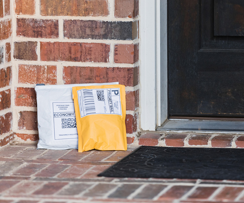 Paper mailers and poly mailers on front porch; mailers packaging; custom poly mailers; padded mailers